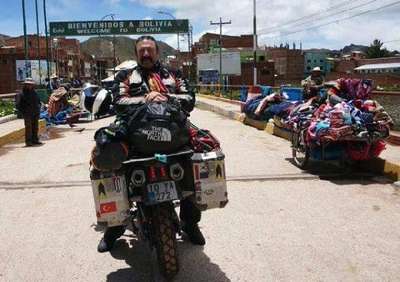 Motosikletiyle dünyayı gezip, Ayvalık'ı tanıtıyor