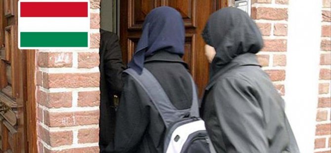 K&H: Bankaya başörtüsüyle giremezsiniz