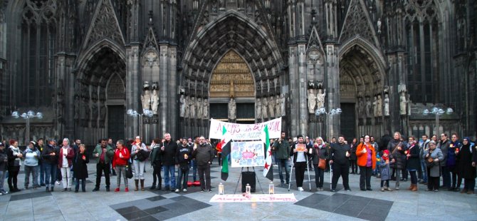 Halep saldırılarının durması için Köln'de insan zinciri