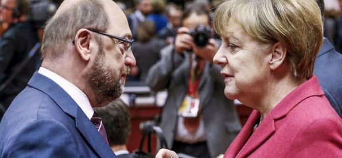 Merkel’in partisi kazandı, başbakan istifa etti