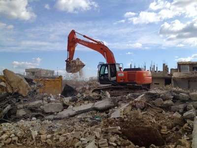 DBP'li belediyelerin iş makinleri Kobani'de savaşın izlerini siliyor