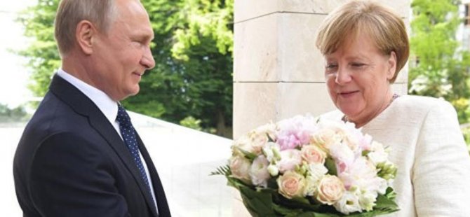 Merkel’e neden çiçek hediye ettiğini anlattı?
