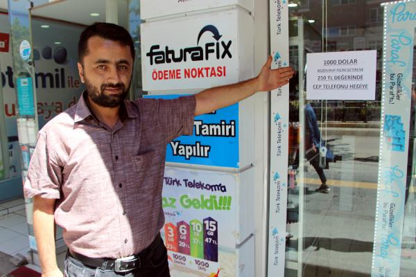 Dolar bozdurana cep telefonu hediye