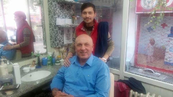 İddiayı kaybeden MHP milletvekili Ok, saçlarını kazıttı