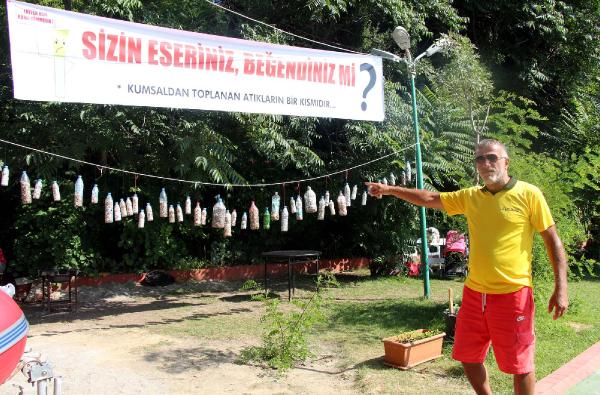 Mavi bayraklı plajda izmarit kirliliğine teşhirli tepki