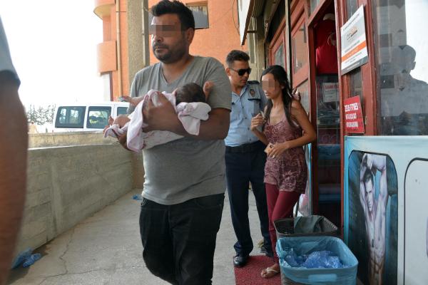 Bebeğiyle kaçırılan kadın, kırmızı ışıkta otomobilden atlayıp esnafa sığındı
