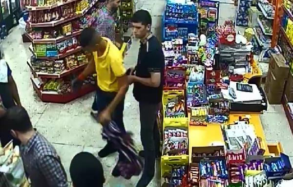 Polise patlayıcı attıktan sonra markette kıyafetini değiştirirken yakalandı