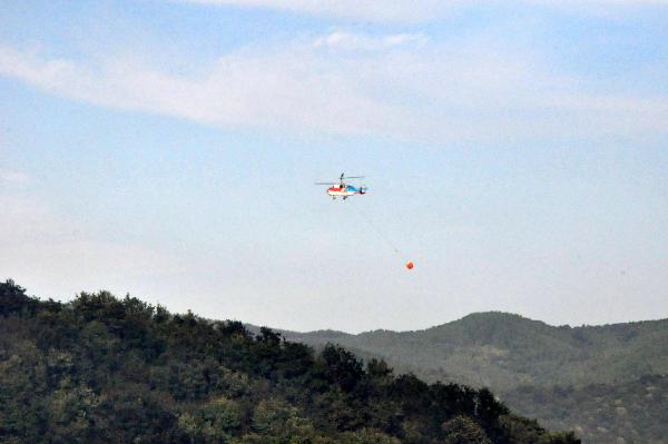 Çöplük yangınına helikopterli müdahale