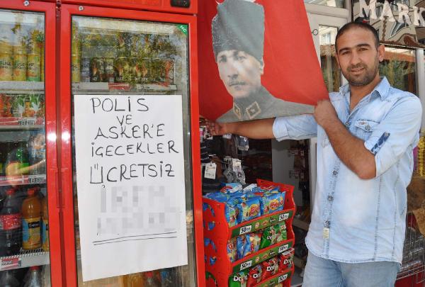 Marketinde, asker ve polislere meşrubatı ücretsiz veriyor