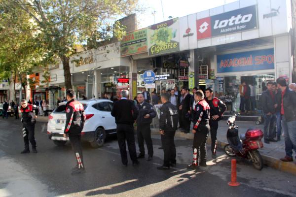 Emekli polis tartıştığı kişiyi ayağından vurdu