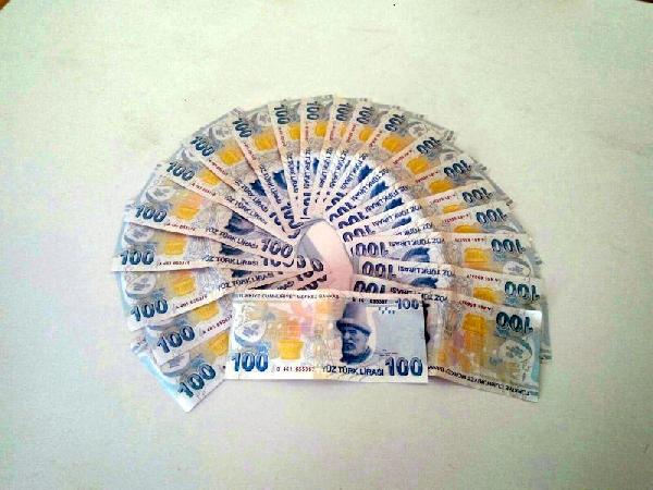 Sahte para ile sigara alınca yakalandılar