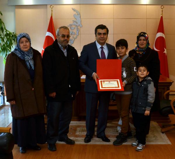Kayserili hayırseverden, bir şehit ailesine daha daire