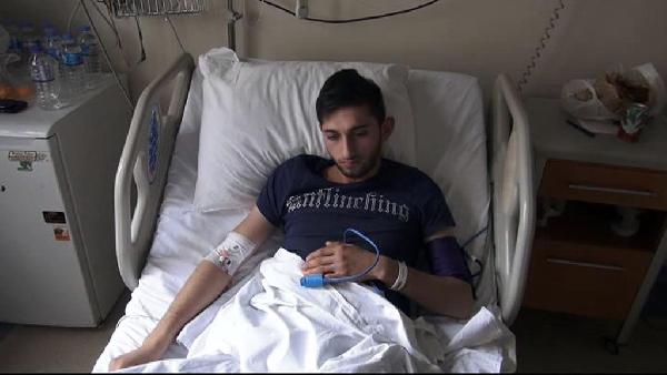 Otobüsteki gencin başına durakta kavga eden kişinin attığı taş geldi