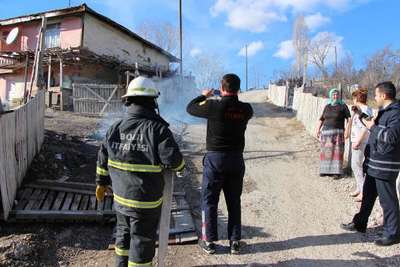 Eşinin hatırası eşyaları yakınca itfaiyeyi alarma geçirdi