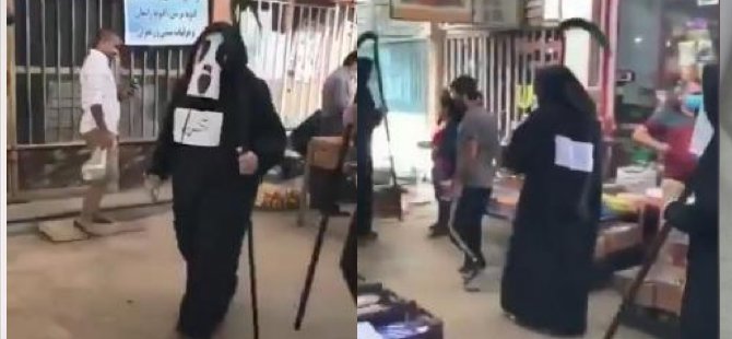 Azrail kostümüyle koronavirüs uyarısı