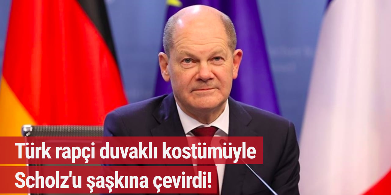 Almanya Başbakanı Scholz'u şaşkına çeviren Türk rapçi!
