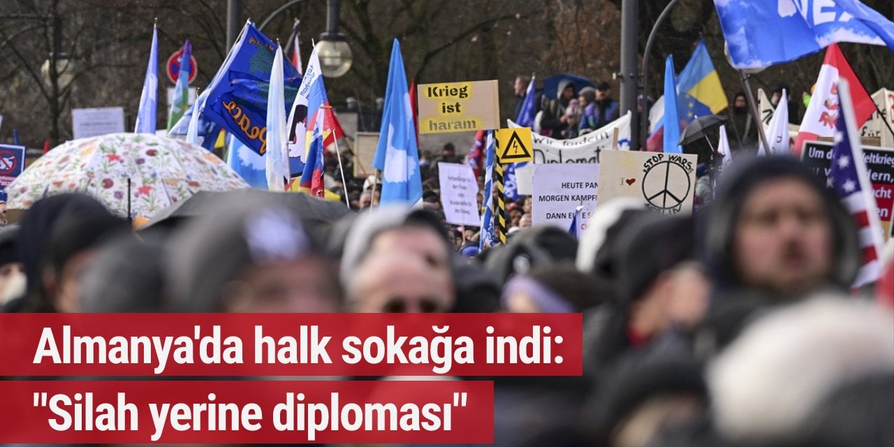 Almanya'da halk sokağa indi: "Silah yerine diploması"