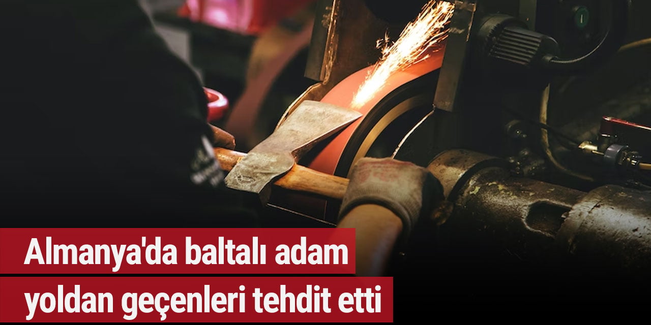 Almanya'da baltalı adam yoldan geçenleri tehdit etti