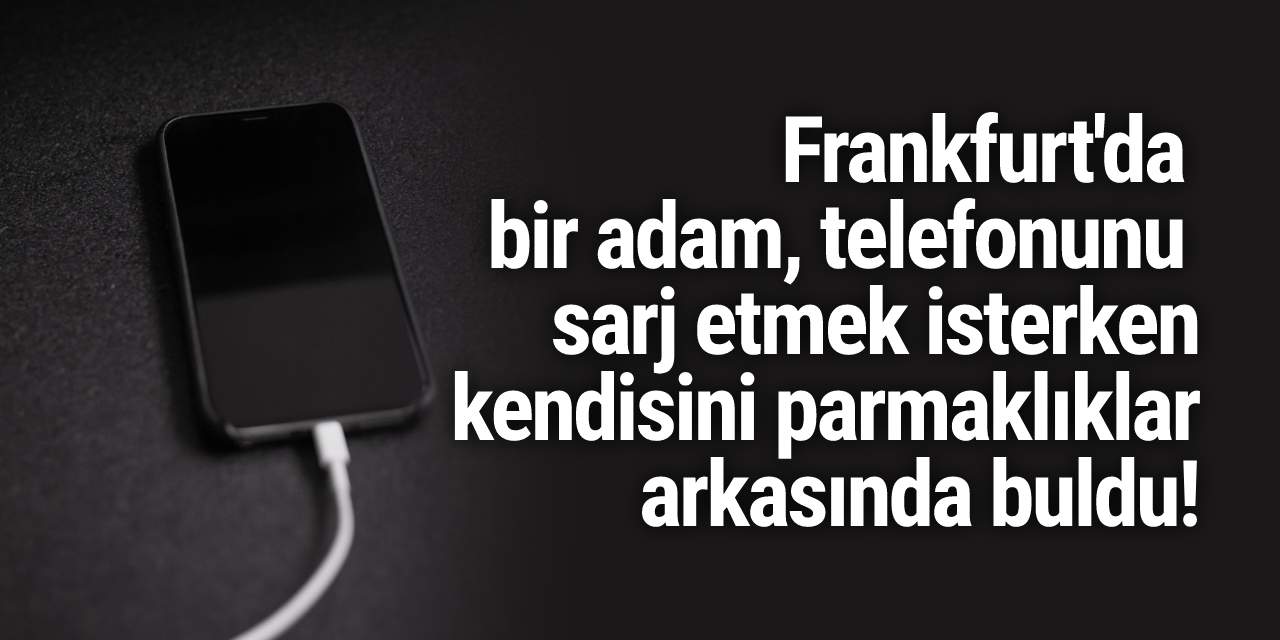 Frankfurt'ta bir adam telefonunu sarj etmek isterken kendisini parmaklıklar arkasında buldu!