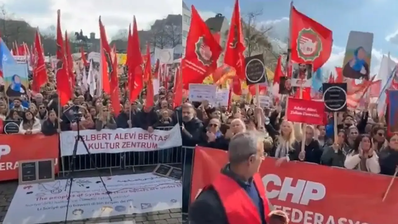 Köln'de on binlerce kişi Suriye'deki katliamı protesto etti