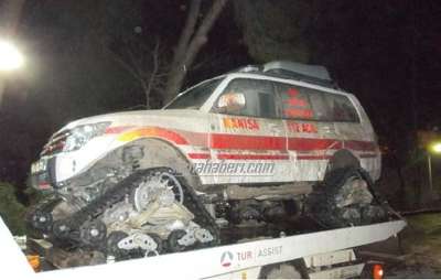KAR AMBULANSINI TAŞIYAN ÇEKİCİYE FAZLA YÜK CEZASI